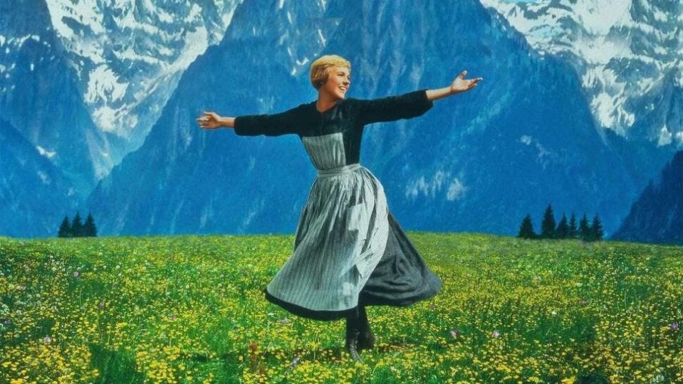 Julie Andrews appears in an iconic scene from the 1965 movie adaptation of "The Sound of Music."