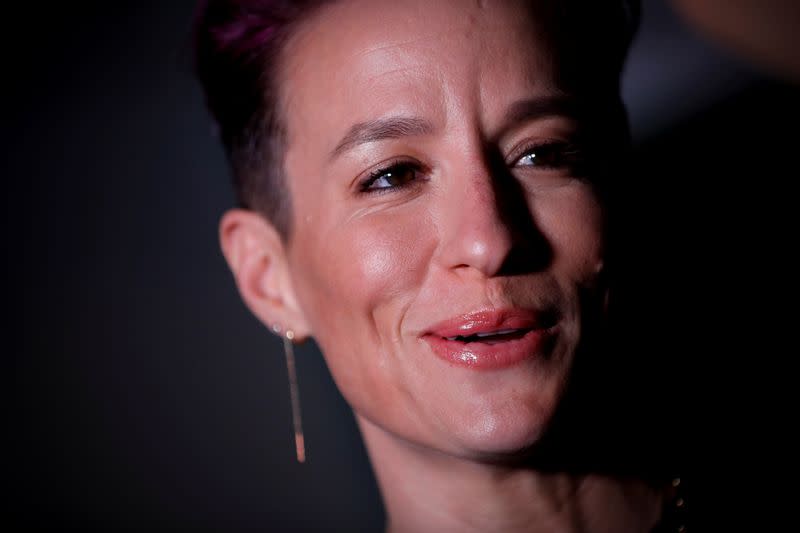 FILE PHOTO: Megan Rapinoe poses as she arrives for Sports Illustrated Sportsperson of the Year Awards in New York