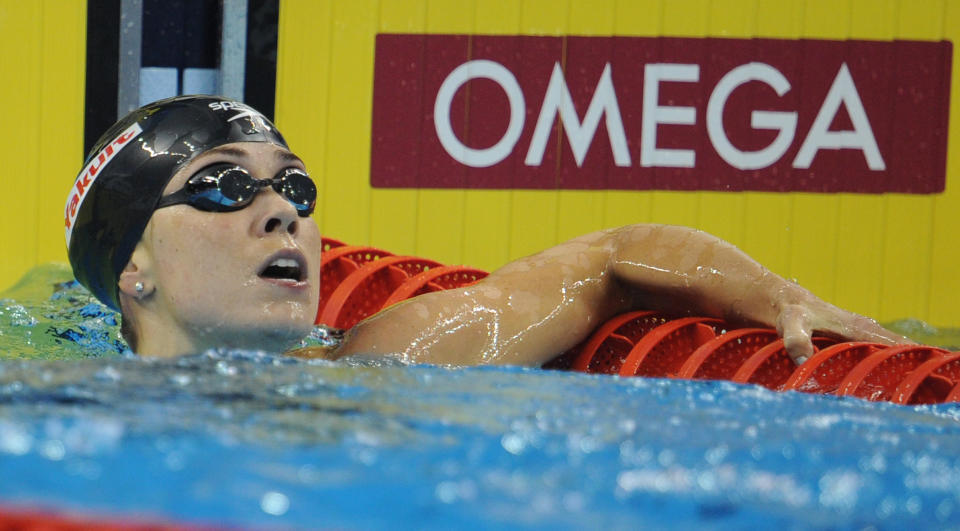 US swimmer Natalie Coughlin looks on after she competed in the final of the women's 100-metre backstroke swimming event in the FINA World Championships at the indoor stadium of the Oriental Sports Center in Shanghai on July 26, 2011. She won bronze. AFP PHOTO / PETER PARKS (Photo credit should read PETER PARKS/AFP/Getty Images)