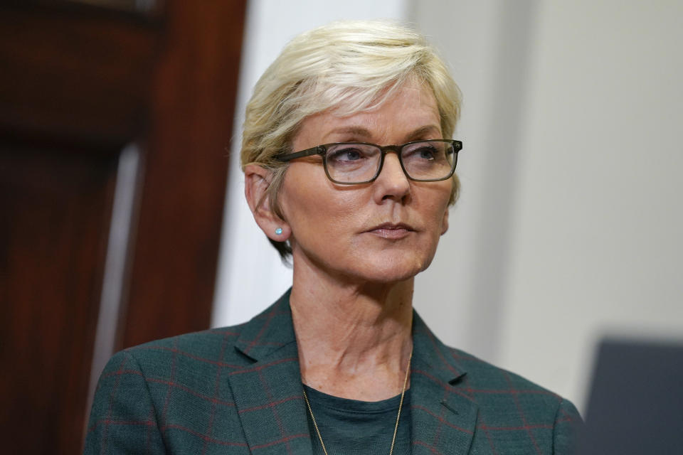 Energy Secretary Jennifer Granholm listens as President Joe Biden speaks about energy and the Strategic Petroleum Reserve during an event in the Roosevelt Room of the White House, Wednesday, Oct. 19, 2022, in Washington. (AP Photo/Evan Vucci)