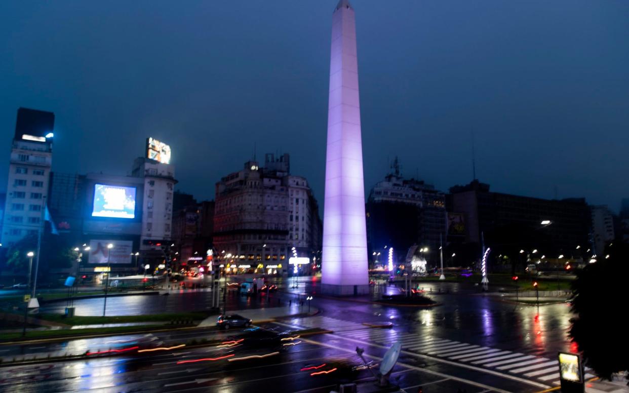Lights coming back on in Buenos Aires - AP