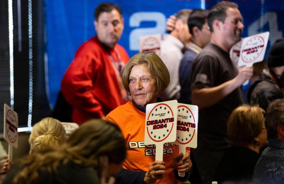 Florida Governor Ron DeSantis supporters wait to hear him speak during a rally at the Never Back Down super PAC headquarters on Saturday, Jan. 13, 2024, in West Des Moines, Iowa. DeSantis, who is campaigning across Iowa, is running for the Republican presidential nomination.