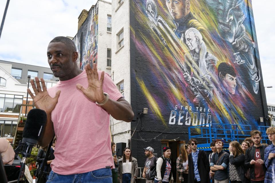 Idris Elba speaks to the media after the unveiling of a Star Trek Beyond mural by artist Jim Vision in Clerkenwell, London (Frantzesco Kangaris/PA)