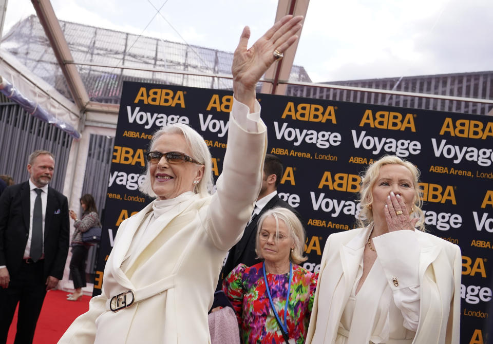 Members of ABBA, Agnetha Faltskog, right, and Anni-Frid Lyngstad arrive for the ABBA Voyage concert at the ABBA Arena in London, Thursday May 26, 2022. ABBA is releasing its first new music in four decades, along with a concert performance that will see the "Dancing Queen" quartet going entirely digital. The virtual version of the band will begin a series of concerts on Thursday. (AP Photo/Alberto Pezzali)