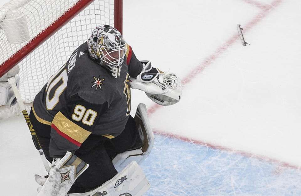 Vegas Golden Knights goalie Robin Lehner loses his skate blade for the second time during the second period against the Chicago Blackhawks in Game 1 of an NHL hockey Stanley Cup first-round playoff series, Tuesday, Aug. 11, 2020, in Edmonton, Alberta. (Jason Franson/The Canadian Press via AP)