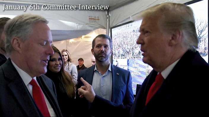 FILE - This exhibit from video released by the House Select Committee, shows a photo of former President Donald Trump talking to his chief of staff Mark Meadows before Trump spoke at the rally on the Ellipse on Jan 6, displayed at a hearing by the House select committee investigating the Jan. 6 attack on the U.S. Capitol, Tuesday, June 28, 2022, on Capitol Hill in Washington. (House Select Committee via AP, File)
