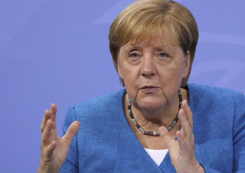 German Chancellor Angela Merkel during a news conference following talks with state leaders to discuss anti-coronavirus measures at the Chancellery in Berlin, Germany, Tuesday Aug. 10, 2021.(Christian Mang/Pool via AP)