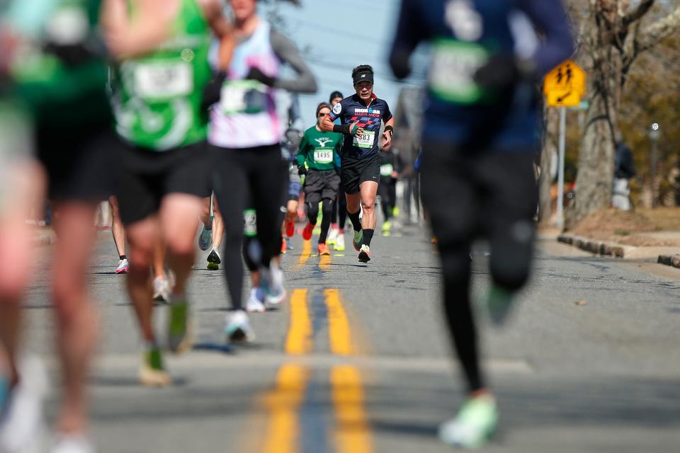 Runners make their way down Rockdale Avenue during the 2023 New Bedford Half-Marathon.