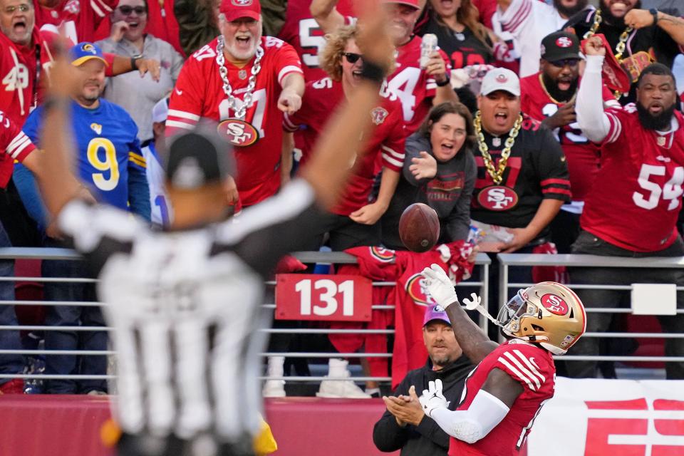 San Francisco 49ers wide receiver Deebo Samuel reacts after scoring a touchdown against the Los Angeles Rams.