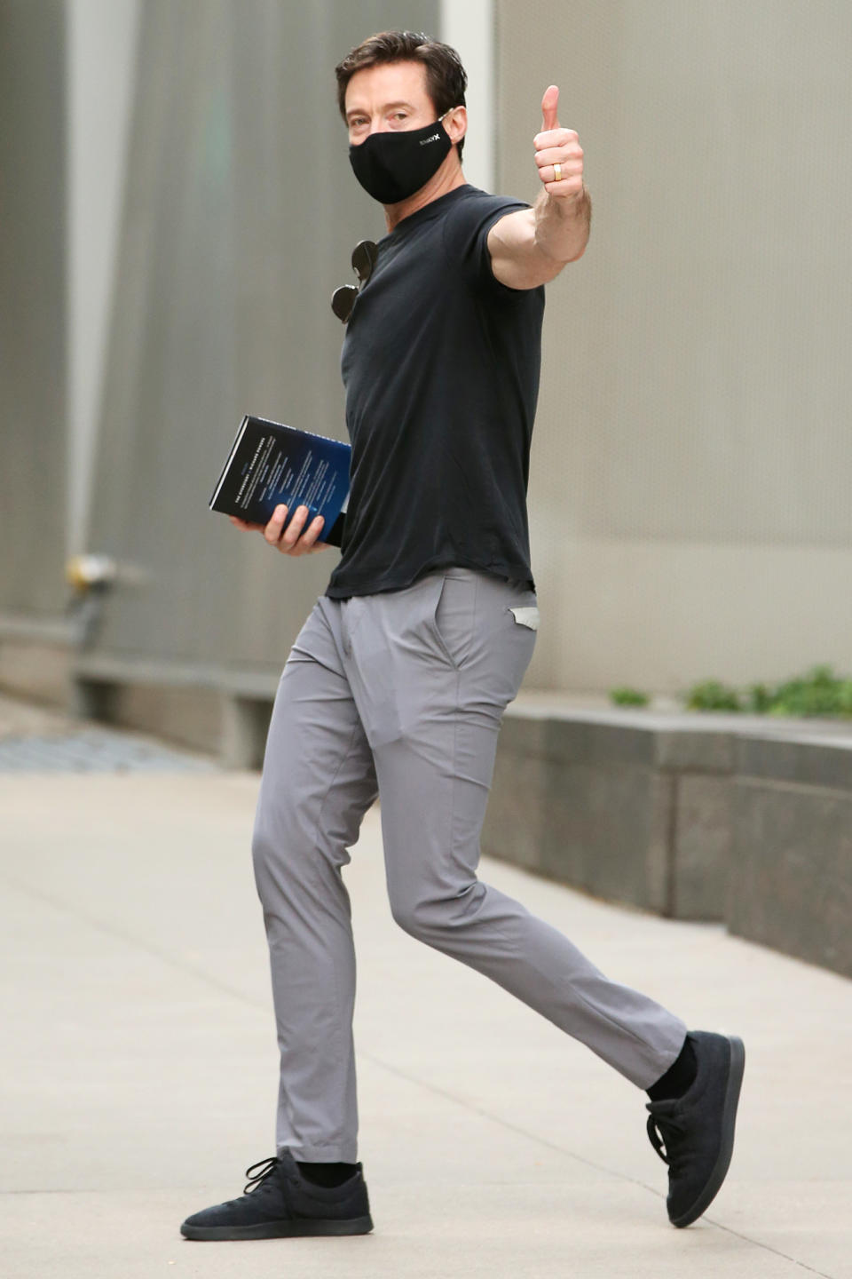 <p>Hugh Jackman flashes a thumbs up while out and about on his birthday on Oct. 12 in N.Y.C. </p>