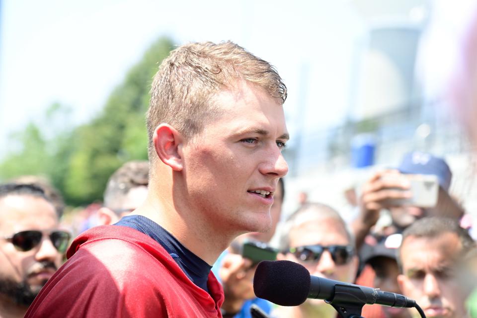 Patriots quarterback Mac Jones speaks to the media after the season's first official training camp session on Wednesday in Foxboro.