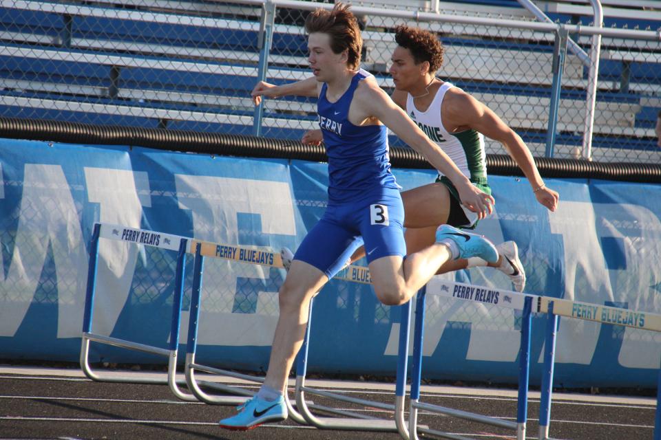 Owen Myers competes in the 400-meter hurdles during the Davis Relays on Thursday, April 13, 2023, at Jim Kaufman Memorial Track in Perry.