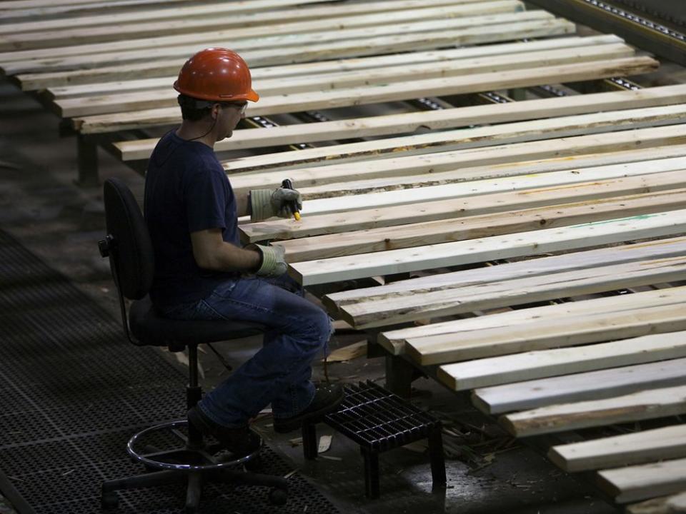  An employee monitors production at the West Fraser Timber Co. Ltd. sawmill in Quesnel, B.C.