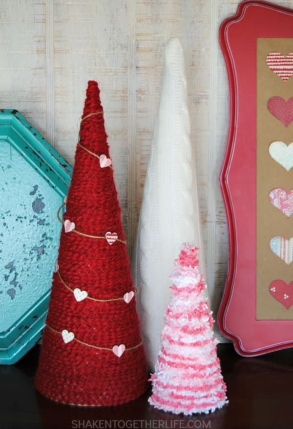 <p>Yarn bomb a few styrofoam cones from the craft store, and you have a cute Valentine's Day mantel display. </p><p><strong>Get the tutorial at <a href="http://www.shakentogetherlife.com/2015/01/valentine-yarn-wrapped-trees.html" rel="nofollow noopener" target="_blank" data-ylk="slk:Shaken Together Life;elm:context_link;itc:0;sec:content-canvas" class="link ">Shaken Together Life</a>.</strong> </p><p><a class="link " href="https://www.amazon.com/Richland-Paper-Mache-Cones-10-5/dp/B07NJBYQGL/ref=sr_1_4?tag=syn-yahoo-20&ascsubtag=%5Bartid%7C10050.g.2971%5Bsrc%7Cyahoo-us" rel="nofollow noopener" target="_blank" data-ylk="slk:SHOP CONES;elm:context_link;itc:0;sec:content-canvas">SHOP CONES</a><strong><br></strong></p>