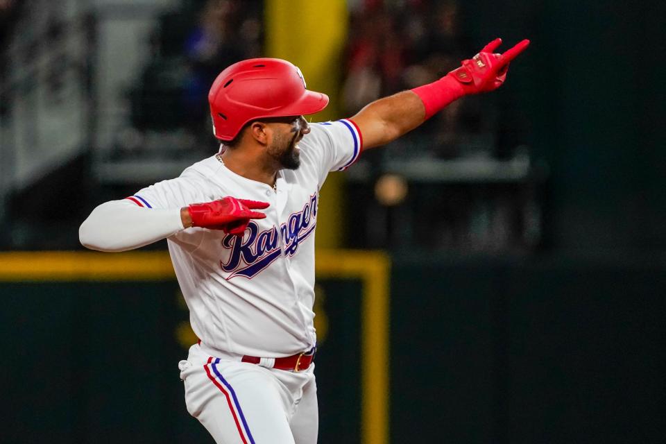 Ezequiel Duran reacts after hitting an RBI double against the Atlanta Braves at Globe Life Field on May 17.