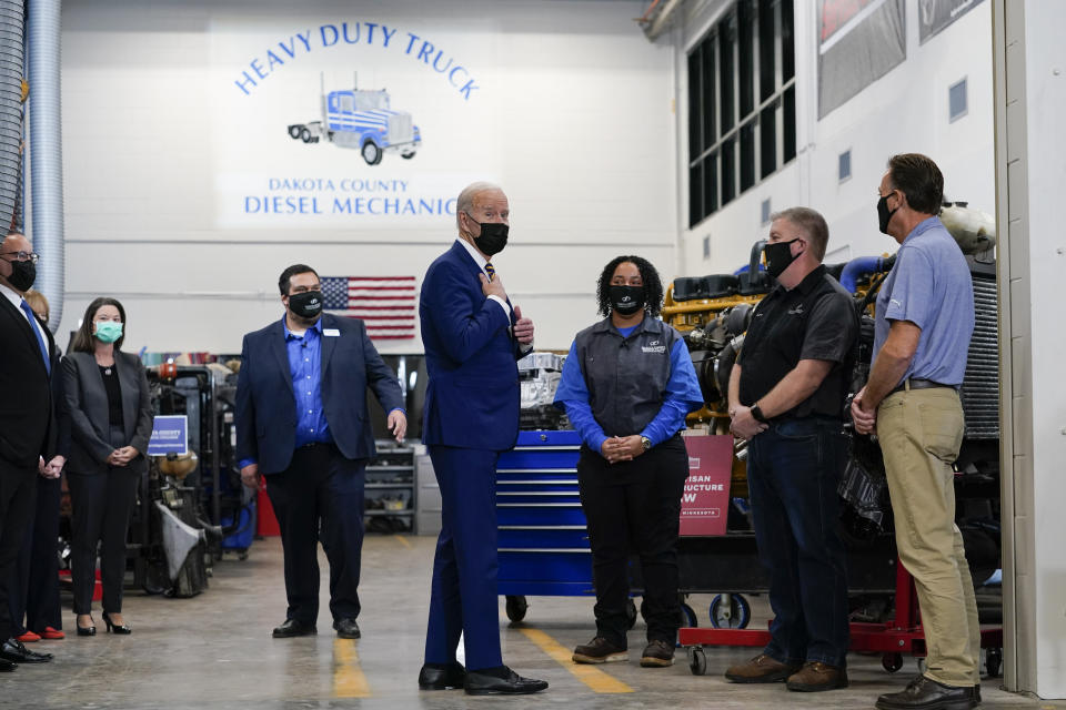 President Joe Biden tours the Dakota County Technical College, in Rosemount, Minn., Tuesday, Nov. 30, 2021. (AP Photo/Carolyn Kaster)