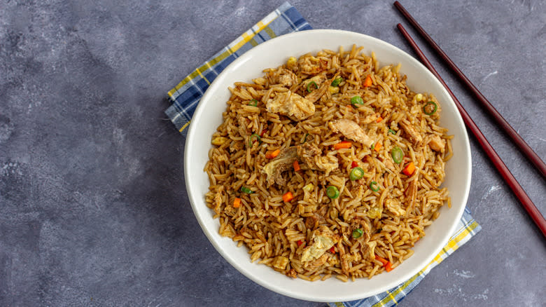 Chicken fried rice with chopsticks