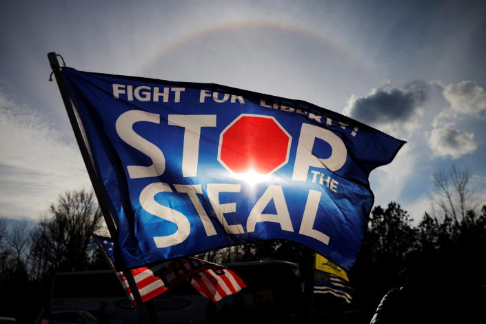 A flag reads: Stop the Steal. 