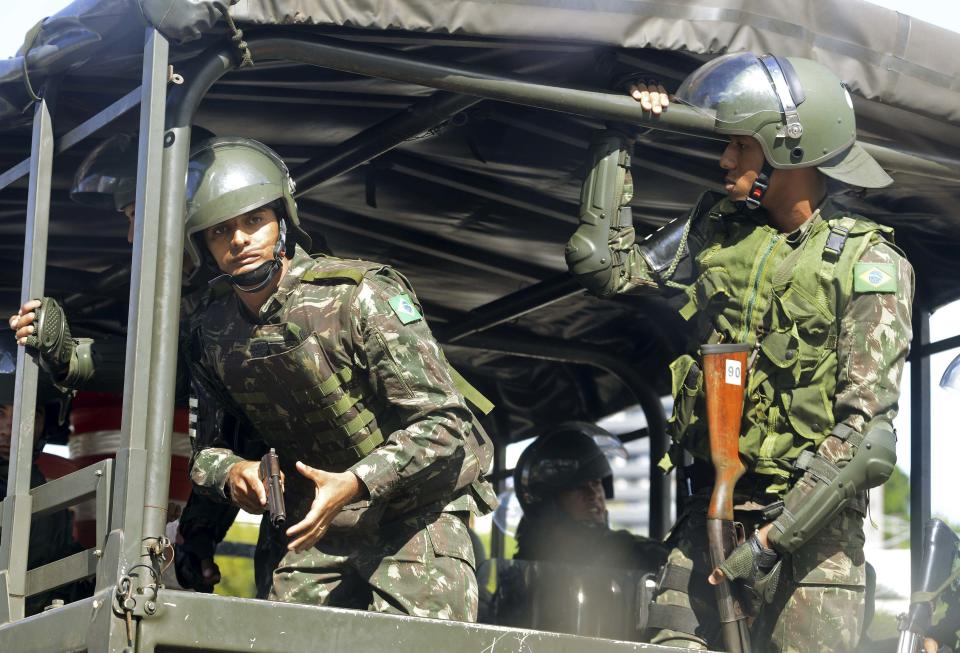 Soldiers patrol the city center during a police strike in Salvador