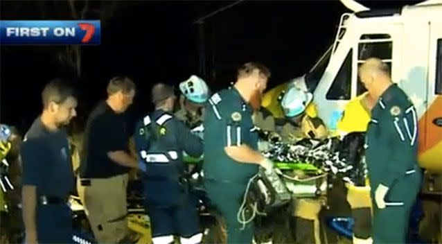 Emergency services try to save the 85-year-old victim. Source: 7News