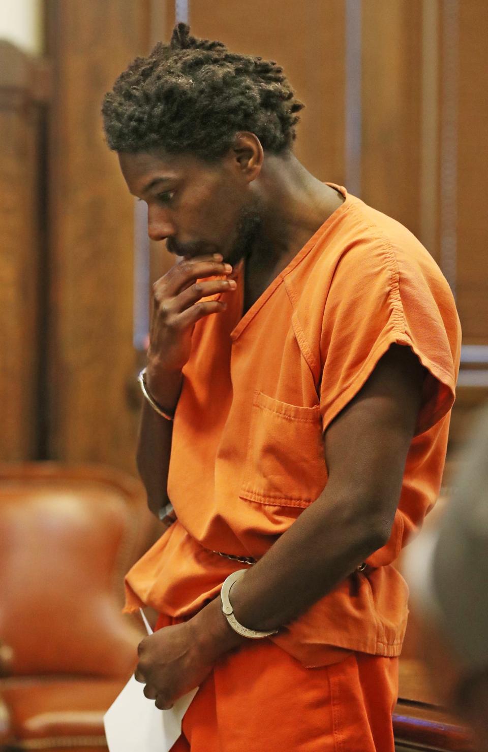 Kahlyl Powe, who is accused in the shooting death of a Lyft driver, ponders a question during a recent hearing in Summit County Common Pleas Court.