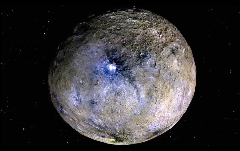 Dwarf planet Ceres shown in false color, and its bright Occator Crater.