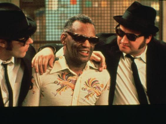 John Belushi (right) alongside Ray Charles and Dan Aykroyd in ‘The Blues Brothers’ (Universal Pictures)