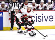 Ottawa Senators center Tim Stutzle (18) skates with the puck during the second period of an NHL hockey game against the Carolina Hurricanes in Ottawa, Ontario, on Sunday, March 17, 2024. (Justin Tang/The Canadian Press via AP)