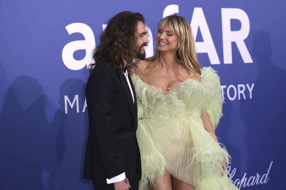 Tom Kaulitz, left and Heidi Klum pose for photographers upon arrival at the amfAR Cinema Against AIDS benefit at the Hotel du Cap-Eden-Roc, during the 76th Cannes international film festival, Cap d'Antibes, southern France, Thursday, May 25, 2023. (Photo by Vianney Le Caer/Invision/AP)