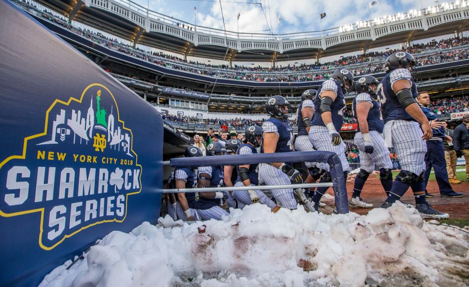 Notre Dame players take the field for the Notre Dame-Syracuse NCAA college football game Saturday, Nov. 17, 2018, at Yankee Stadium in New York City. The Irish will play again at the home of the Yankees again on Nov. 23, 2024 against Army.