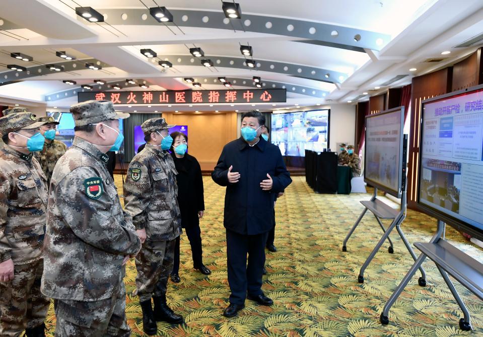 Chinese President Xi Jinping is briefed about the Huoshenshan Hospital in Wuhan in central China's Hubei Province on March 10.