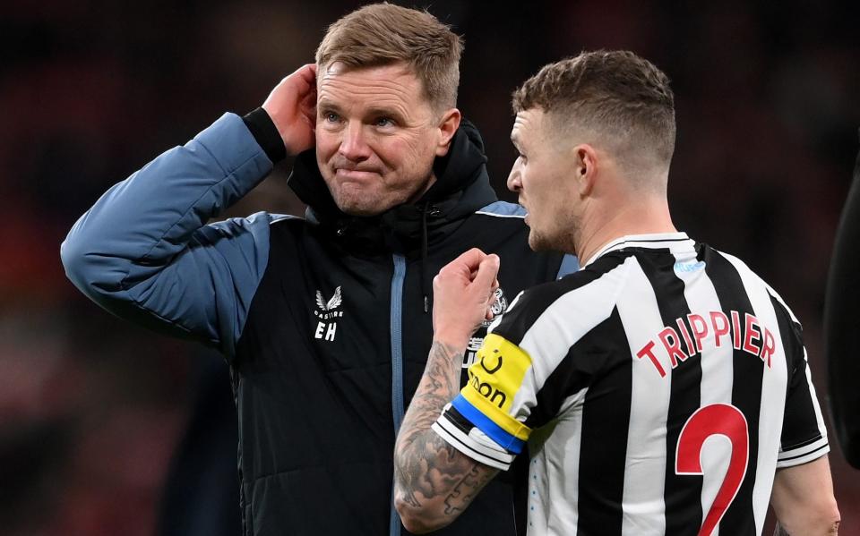 Eddie Howe, Manager of Newcastle United, and Kieran Trippier - Newcastle United via Getty Images