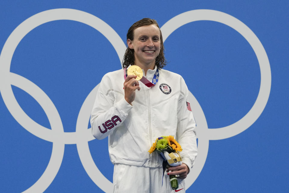 FILE - Kathleen Ledecky, of United States, poses after winning the gold medal in the women's 800-meter freestyle final at the 2020 Summer Olympics, July 31, 2021, in Tokyo, Japan. The world swimming championships start in Budapest on Saturday June 18, 2022, where Katie Ledecky will hope to reclaim her world record in the 400 freestyle. (AP Photo/Gregory Bull, File)