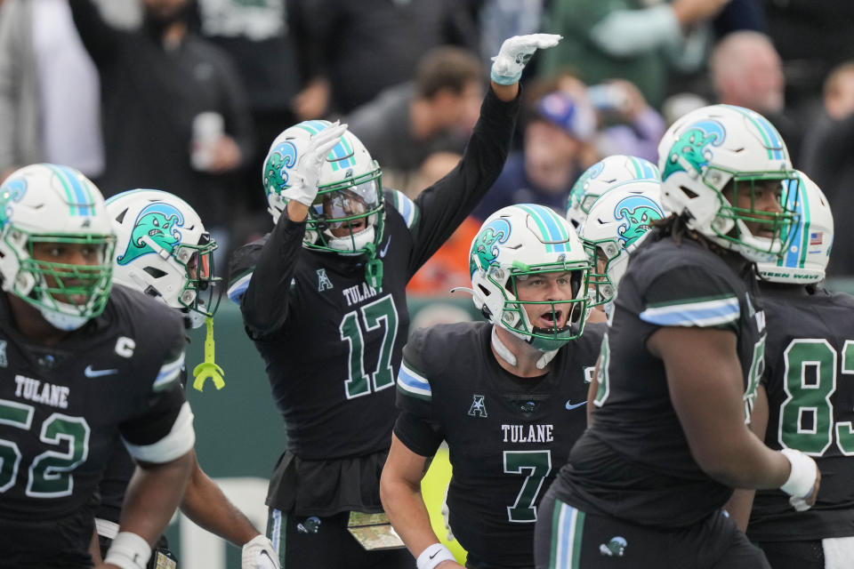 Tulane wide receiver Chris Brazzell II (17) celebrates his touchdown reception with quarterback Michael Pratt (7) in the first half of an NCAA college football game against UTSA in New Orleans, Friday, Nov. 24, 2023. (AP Photo/Gerald Herbert)