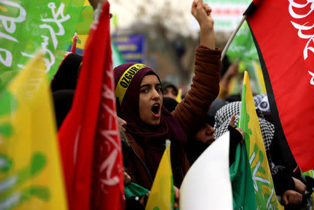 Pro-Palestinian demonstrators shout slogans during a protest against the U.S. decision to recognise Jerusalem as the capital of Israel, in Diyarbakir, Turkey, December 17, 2017. REUTERS/Sertac Kayar