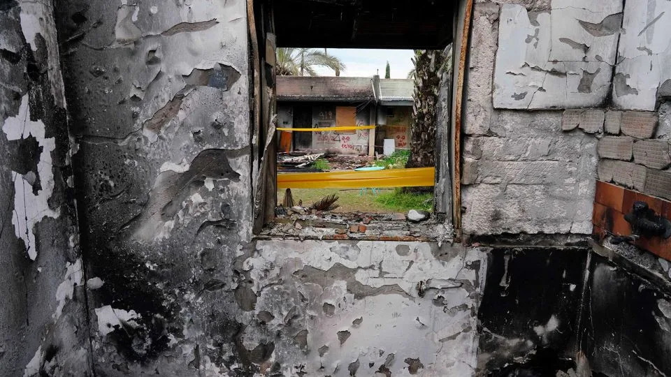 A view from inside the destroyed house of released hostage Amit Soussana, kidnapped during the deadly October 7 attack by Palestinian Islamist group Hamas, at the Kibbutz Kfar Aza in Israel on January 29, 2024. - Alexandre Meneghini/Reuters/File