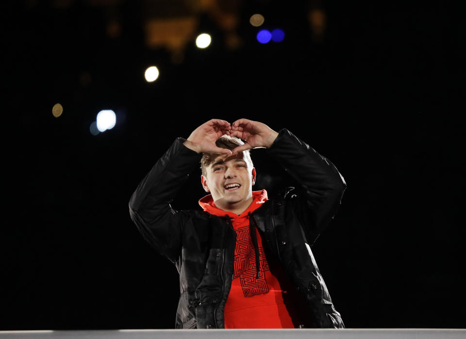 <p>DJ Martin Garrix from the Netherlands gestures during the closing ceremony of the 2018 Winter Olympics in Pyeongchang, South Korea, Sunday, Feb. 25, 2018. (AP Photo/Kirsty Wigglesworth) </p>