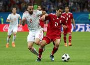 Soccer Football - World Cup - Group B - Iran vs Spain - Kazan Arena, Kazan, Russia - June 20, 2018 Spain's Dani Carvajal in action with Iran's Vahid Amiri REUTERS/Sergio Perez