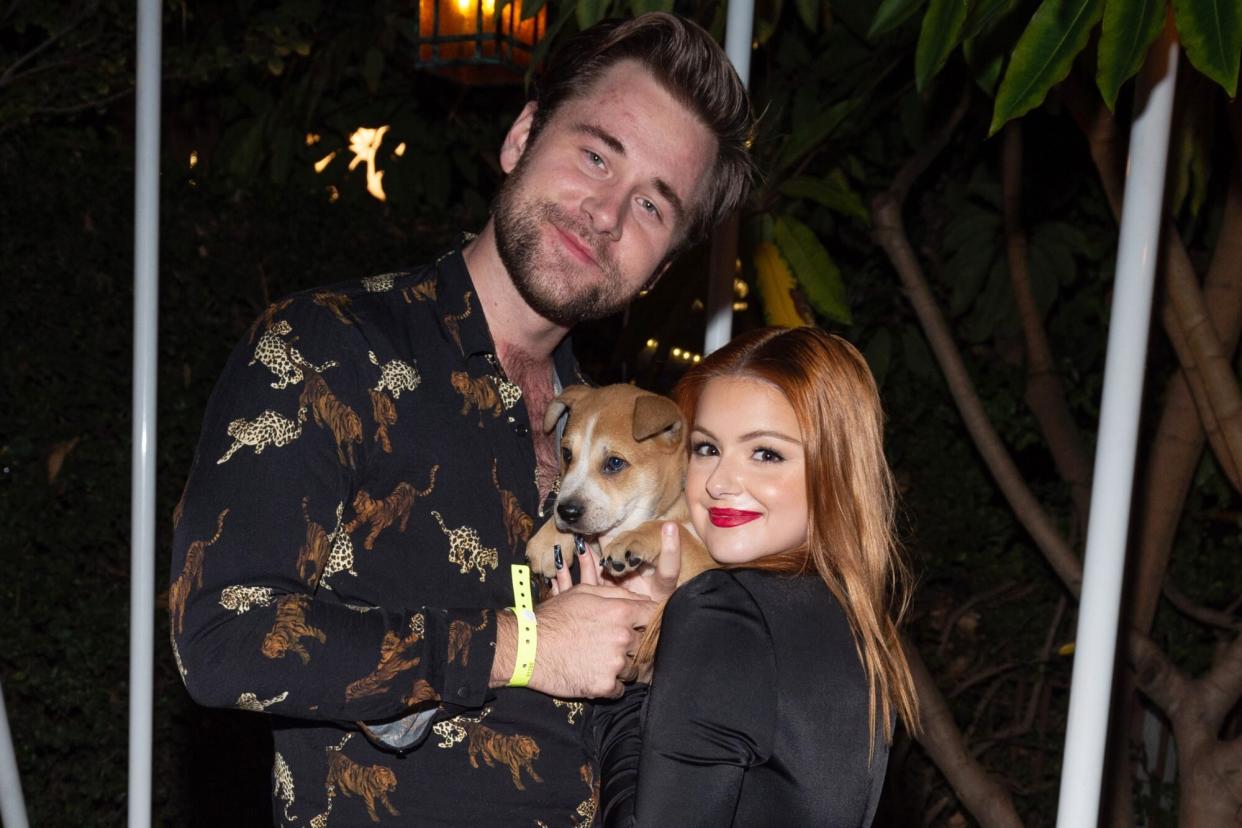 LOS ANGELES, CALIFORNIA - NOVEMBER 06: Actress Ariel Winter and actor Luke Benward meet "Cupid" the dog at the Wags & Walks 10th Annual Gala at the Taglyan Complex on November 06, 2021 in Los Angeles, California. (Photo by Amanda Edwards/Getty Images)