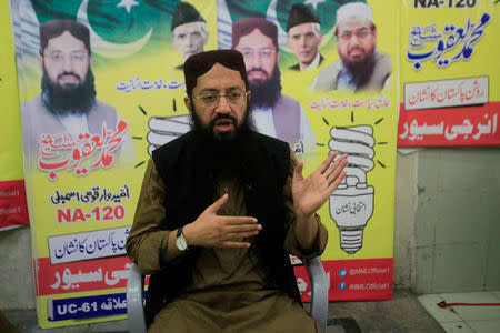 Mohammad Yaqoob Sheikh, nominated candidate of political party, Milli Muslim League (MML), gestures while talking with Reuters correspondent, during an election campaign for the National Assembly NA-120 constituency in Lahore, Pakistan September 10, 2017. REUTERS/Mohsin Raza