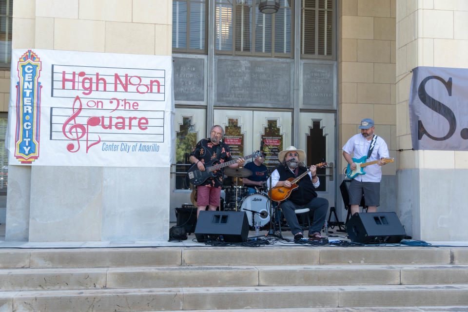 Andy Chase and Friends entertain the crowd during this year's High Noon on the Square series outside the Potter County Courthouse in downtown Amarillo.