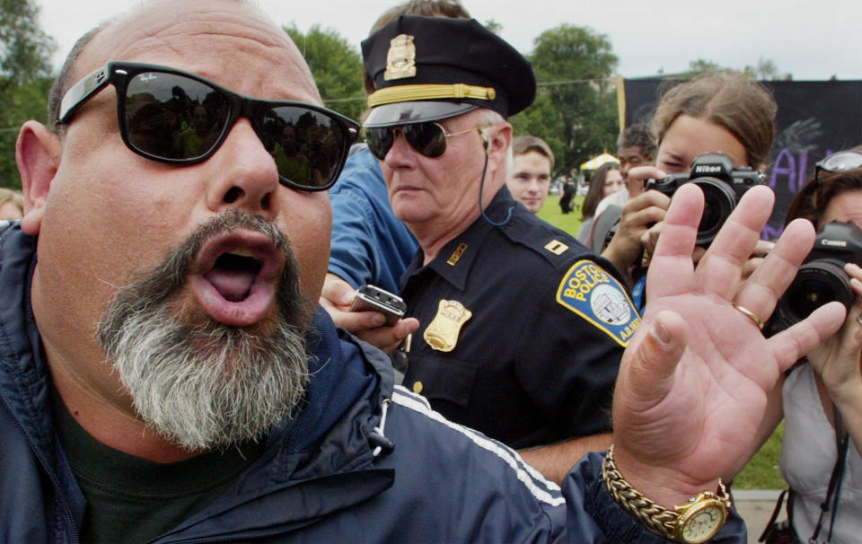 FILE - In this July 27, 2004 file photo, Ruben Israel yells at protesters as he walks through the Boston Commons. Israel, who has crossed the country for 30 years to denounce behavior he considers sinful at venues including Mardi Gras and the newer Southern Decadence festival says followers arrested during this year’s Decadence will challenge a city ordinance that forbids preaching after dark on Bourbon Street in New Orleans. (AP Photo/Rick Bowmer, File)