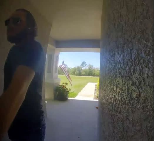 <p>Polk Sheriff/Youtube</p> Emmanuel Espinoza seen in doorcam footage arriving at his mother's home on April 6 prior to the attack