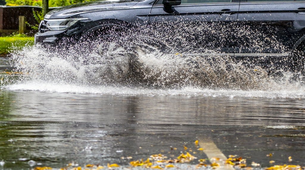 A dozen flood warnings were in place as rain hit the country south from Glasgow to the border (Peter Byrne/PA) (PA Media)