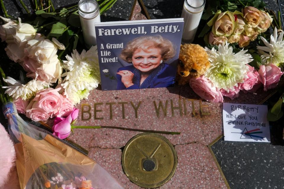 Michelle Obama, Pink and Oprah Winfrey have all added to the long list of celebrity tributes to ‘legendary’ US actress Betty White following her death aged 99 (Ringo HW Chiu/AP) (AP)