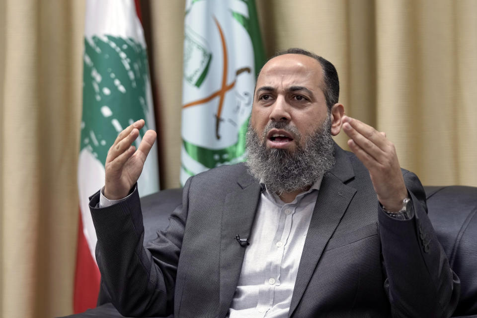 The Secretary-General of the Islamic Group Sheikh Mohammed Takkoush, speaks during an interview with The Associated Press in Beirut, Lebanon, Tuesday, March 26, 2024. Takkoush allied with Hamas and Hezbollah said Tuesday they are closely coordinating with both groups along the southern border with Israel where they have claimed responsibility for several attacks over the past months. (AP Photo/Bilal Hussein)