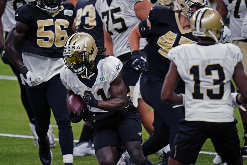 New Orleans Saints running back Alvin Kamara (41) runs through drills during NFL football practice in New Orleans, Thursday, Sept. 3, 2020. (AP Photo/Gerald Herbert, Pool)