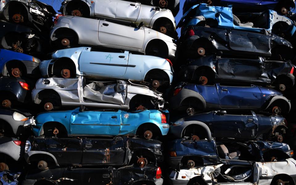 HAMBURG, GERMANY - MARCH 19: Crushed cars, including Audi and Volkswagen diesel EURO 4 - Alexander Koerner/Getty Images