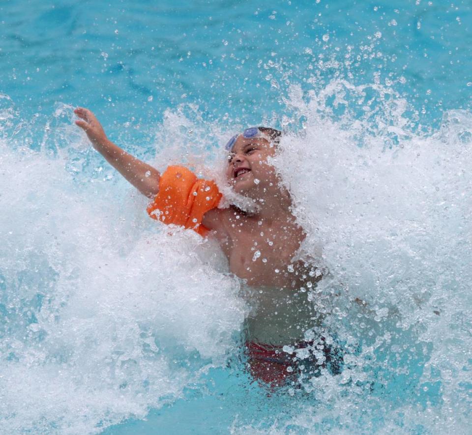 Kids make a splash in the wave pool at Buccaneer Bay Water Park at Buccaneer State Park in Waveland in this file photo. The park opens Memorial Day Weekend with an expansion. JOHN FITZHUGH/Sun Herald File