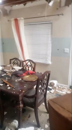 Damaged furniture is seen at the house of a survivor following the aftermath of Hurricane Dorian in Marsh Harbour